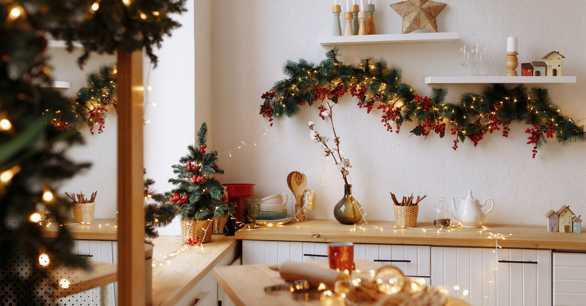 A festive kitchen adorned with warm holiday decorations.